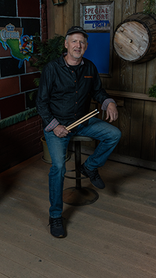 Dean White plays drums for the Good Bad and the Funky