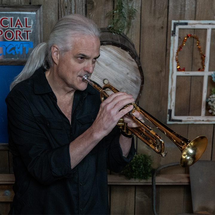 Steve Strand Bio Pic 1 with trumpet