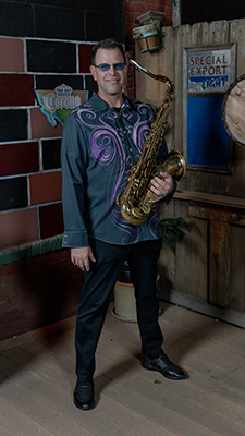 Terry Peffer plays saxophone for the Good Bad and the Funky
